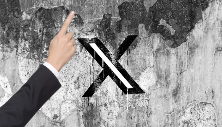 x-is-nudging-users-to-promote-their-posts-with-a-pointing-hand,-and-people-are-confused